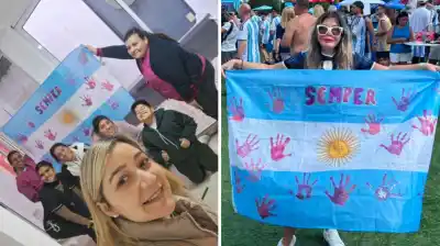 La bandera de las ‘manos rosas’ que viajó desde Tucumán al Mundial: la historia que emociona